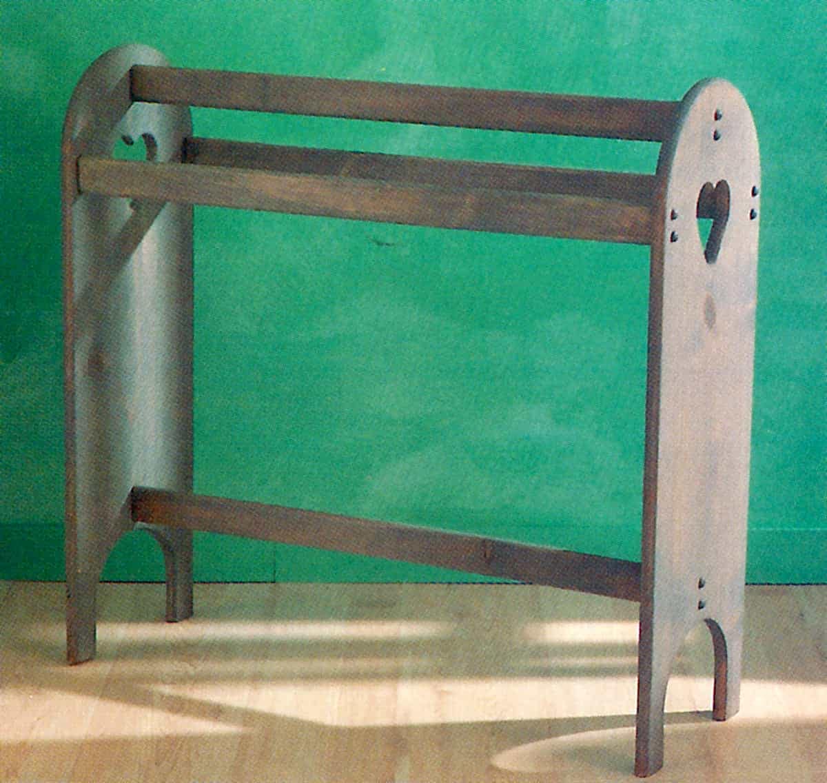 Stained wood towel rail